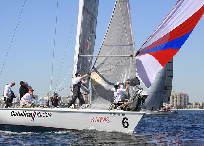 Tommy Pickard’s crew douses the spinnaker © Rich Roberts